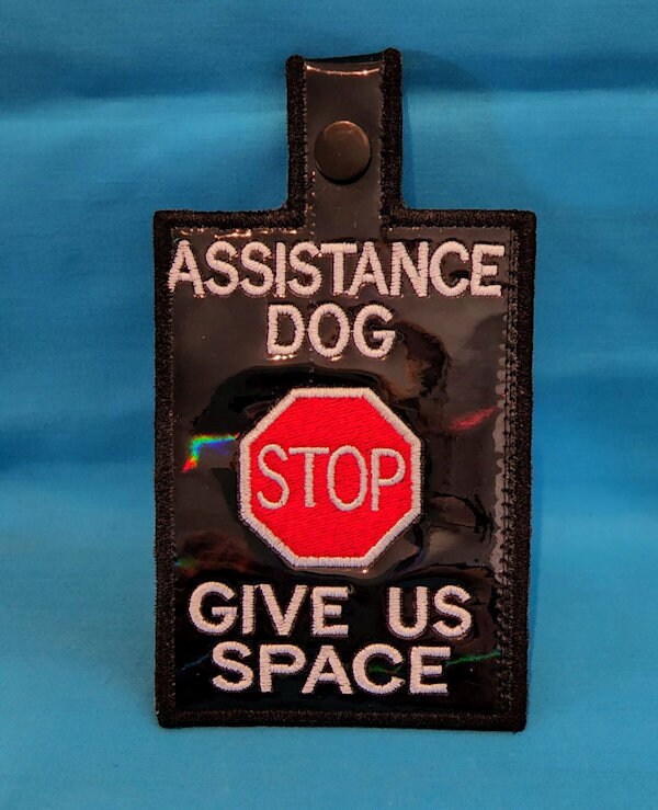 CUSTOM embroidered TAG with rear zipper pocket and snap closure